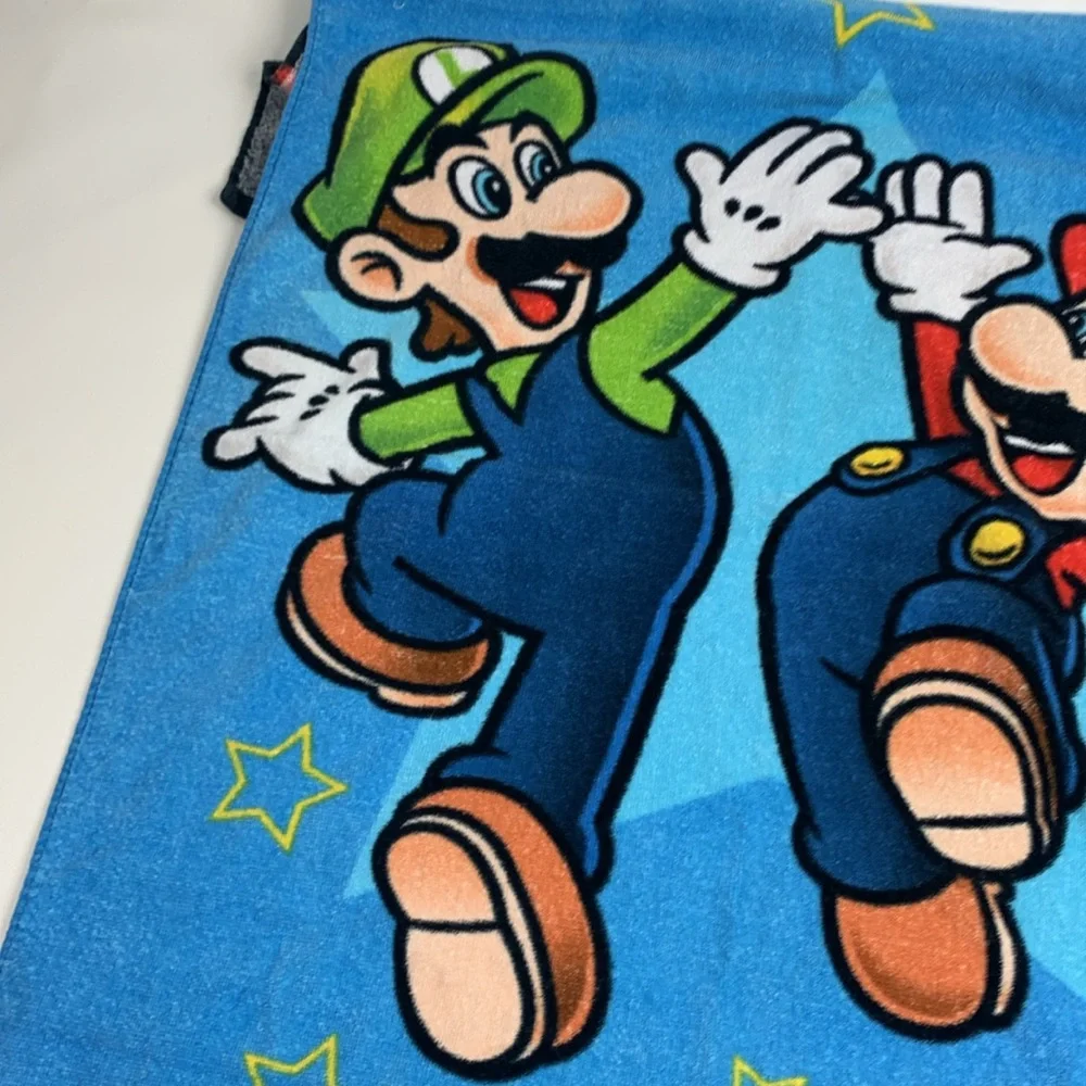 Nintendo Super Mario Bros colorful Blue Beach Towel Video game towel 27x52”